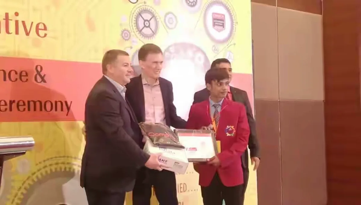 Siddhant Gour receiving his award on stage at the IANT and CompTIA Skills Initiative ceremony
